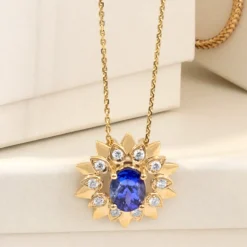 AAA-Tansanit-Goldanhänger (de Melo)